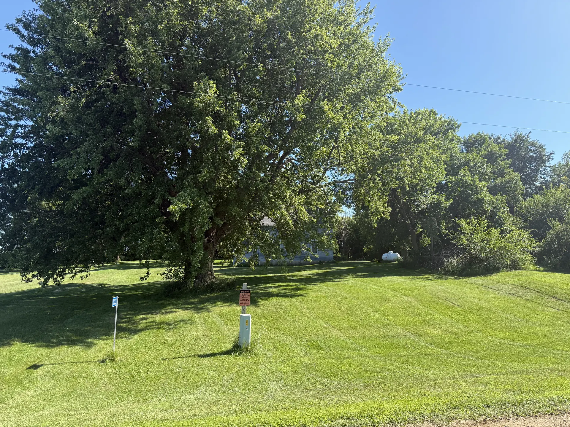 Freshly mowed green lawn completed by Hometown Outdoor Services